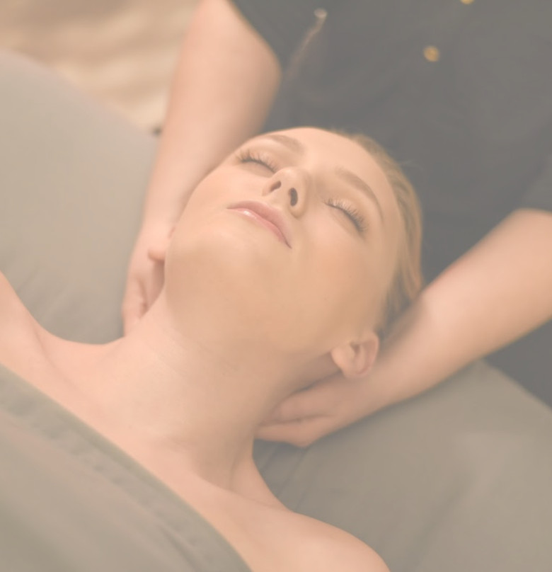 Woman getting a neck massage